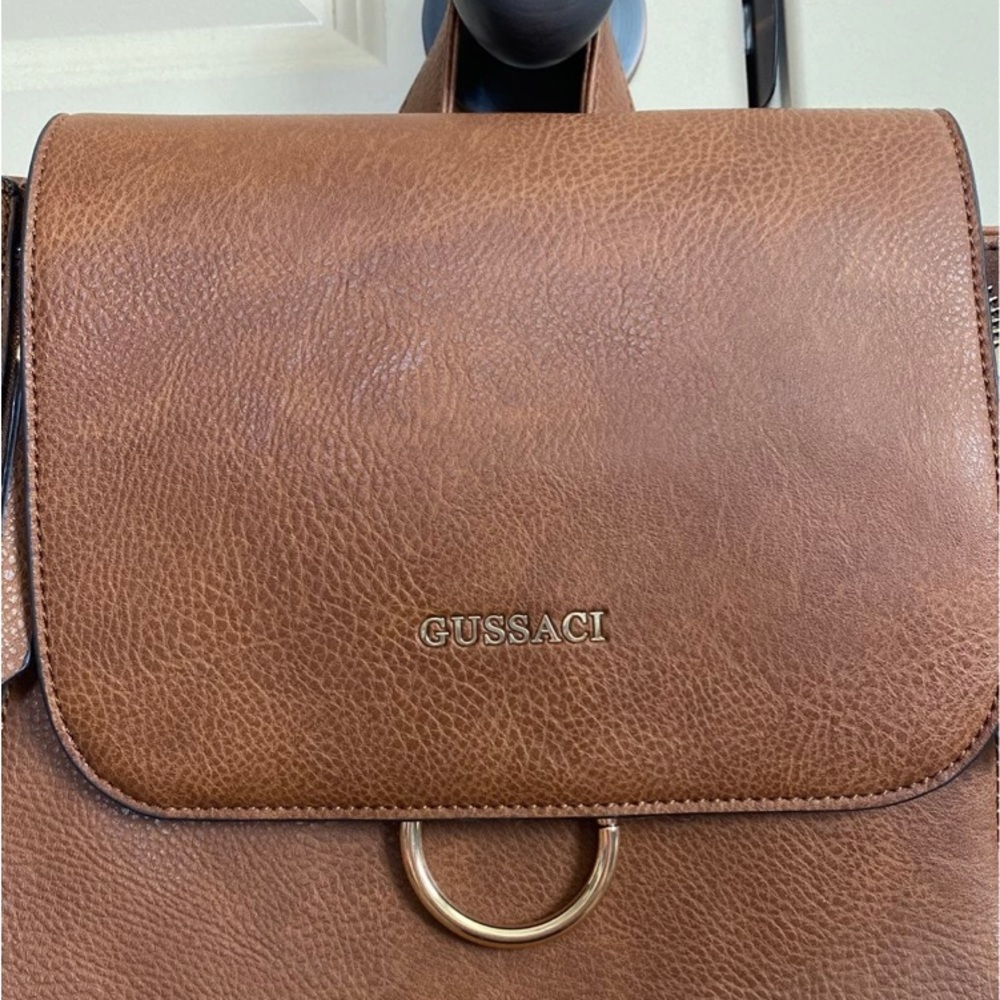 Brown leather, backpack/handbag.